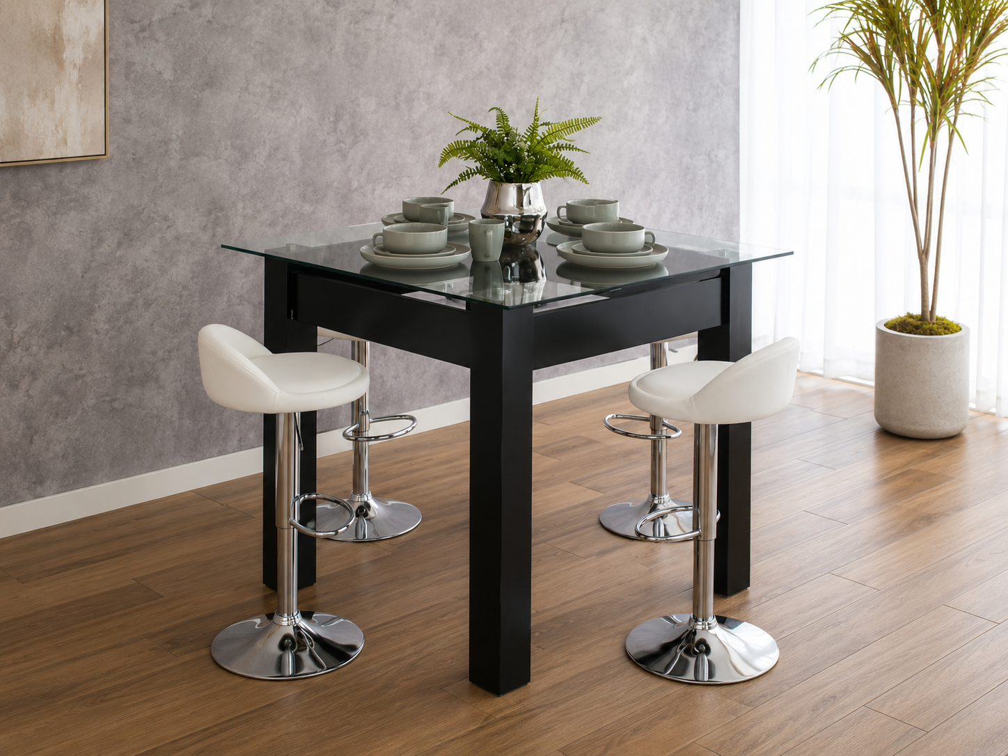Imagen recomendada: desayunador moderno dentro de una cocina pequeña o departamento, con mesa compacta, sillas y decoración en tonos neutros.