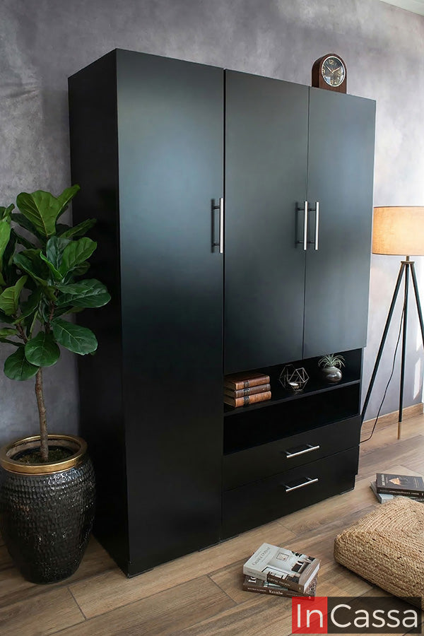 La imagen presenta el clóset ANGANGUEO en acabado chocolate, con puertas abatibles, repisa central abierta y cajones inferiores. Sus jaladeras metálicas y líneas rectas aportan un diseño elegante, ideal para organizar con estilo cualquier espacio.