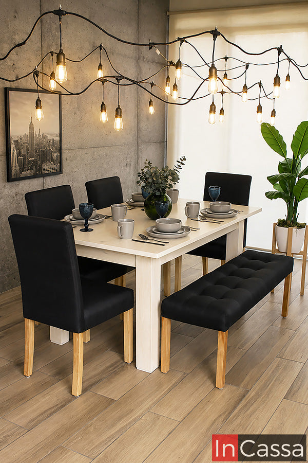 Se aprecia el Comedor con banca Modelo BISÁU para 6 personas, con mesa en acabado natural y sillas junto con banca tapizadas en lino color chocolate. Su diseño contemporáneo combina una amplia superficie, cómodos asientos acolchonados y una práctica banca, creando un ambiente cálido, elegante y funcional para disfrutar reuniones familiares o con amigos.