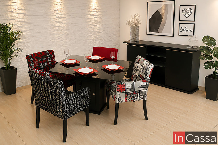 En esta toma en perspectiva del Antecomedor Modelo BUCAREST para 4 personas en color chocolate, destaca su cubierta oscura y base central con espacio de almacenamiento. Las sillas en lino Europa, lino Da Vinci negro, lino Casa roja y lino rojo crean una combinación original de estampados y tonalidades, aportando un estilo urbano, moderno y lleno de personalidad al comedor.