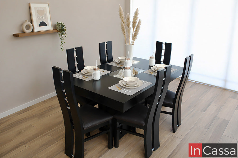 Se observa el Comedor Modelo CÓRDOBA para 6 personas en color chocolate con asientos tapizados en tacto piel color chocolate. Su mesa con elegante detalle central de cristal y sus sillas de diseño contemporáneo ofrecen comodidad, resistencia y un estilo sofisticado para disfrutar reuniones familiares y momentos especiales.