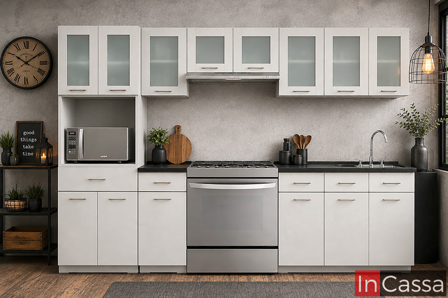 Se observa la Cocina Integral KENIA de 2.40 m para ESTUFA en color blanco con cubierta de formaica en estilo mármol negro, una propuesta que combina amplitud, elegancia y funcionalidad. Sus múltiples gabinetes y vitrinas ofrecen un excelente espacio de almacenamiento para mantener la cocina organizada.
