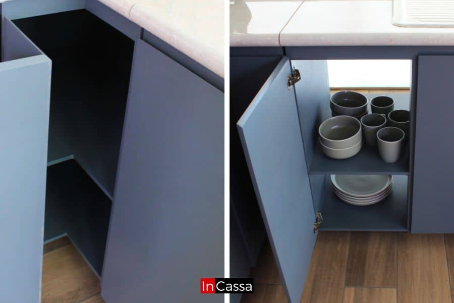 Las imágenes muestran la funcionalidad del diseño de gabinetes inferiores de la cocina. A la izquierda, un gabinete con estantes ofrece almacenamiento flexible para utensilios o electrodomésticos de gran tamaño. A la derecha, otro gabinete almacena platos y tazas de manera ordenada, con fácil acceso. El acabado en gris medio completo y cubierta de formaica estilo ojo de pájaro ayudan a mantener una estética moderna y elegante, mientras que las bisagras reforzadas garantizan durabilidad y uso prolongado.