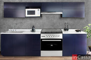 En esta fotografía se aprecia la Cocina Integral NICARAGUA completamente montada con una estufa de 30″, que se integra armoniosamente entre los módulos inferiores. El diseño lineal en tono azul rey mate destaca sobre el fondo gris texturizado, mientras la cubierta de formaica blanco fresh y los electrodomésticos en acero inoxidable complementan el estilo moderno y funcional del conjunto.