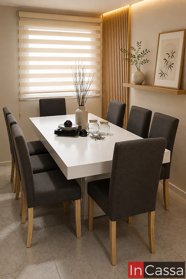 Se observa el Comedor Modelo OBEN para 8 personas en color blanco con sillas tapizadas en lino mouse, un diseño moderno que combina una amplia cubierta de acabado limpio con una estructura sólida y funcional. Sus ocho sillas tapizadas en lino brindan gran comodidad y un elegante contraste con las patas en tono natural, creando un ambiente cálido, luminoso y perfecto para reuniones familiares o comidas con invitados.
