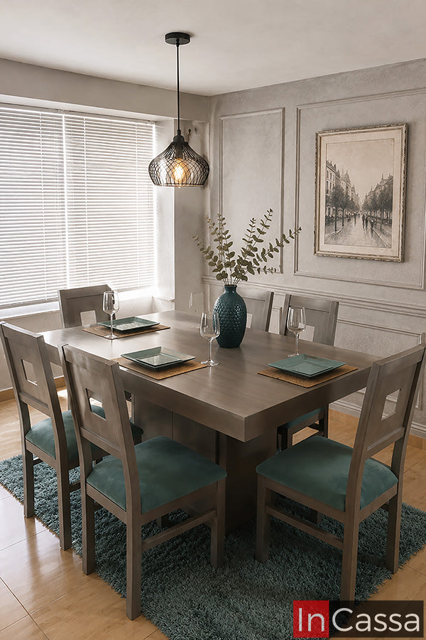 Se observa el Comedor Modelo POLONIA para 6 personas en color gris cenizo claro con asientos tapizados en suede turquesa, una propuesta de estilo contemporáneo que combina tonos neutros con un elegante contraste de color. Su amplia cubierta ofrece el espacio ideal para compartir en familia, mientras que las sillas acolchadas brindan gran comodidad y un toque moderno que realza cualquier comedor.