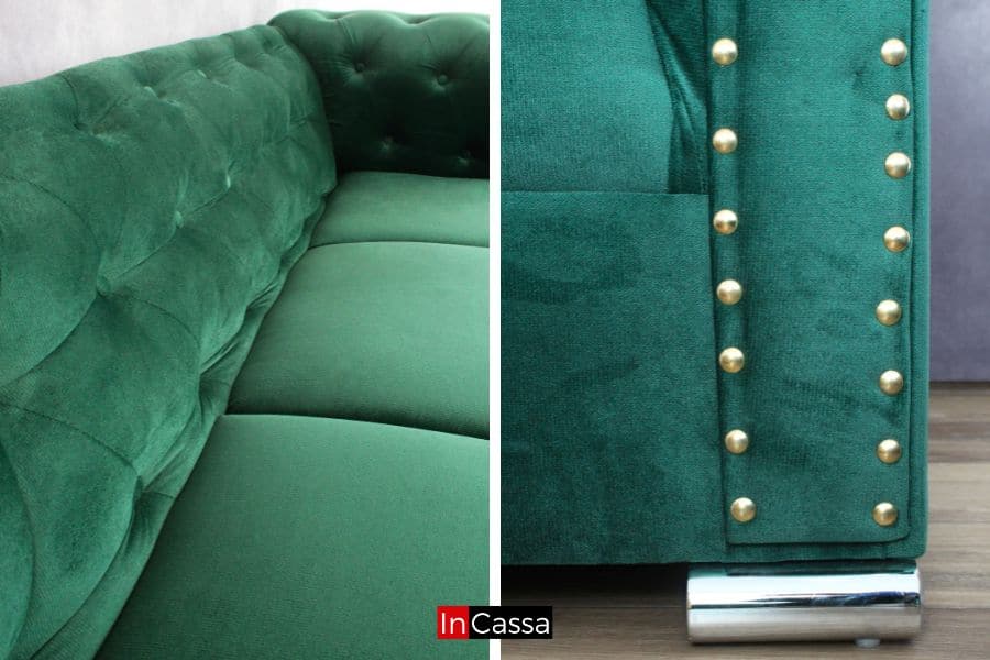 La imagen resalta el tapizado en tono verde botella con acabado capitoneado y remaches dorados en el lateral. Se aprecian las patas metálicas cromadas que aportan un toque elegante y moderno al diseño.