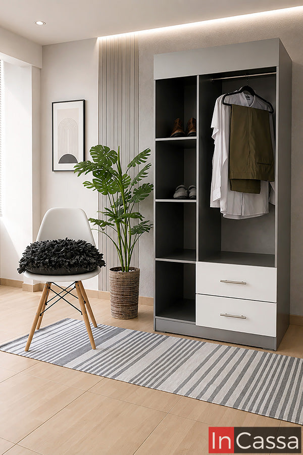 Se muestra el Guardarropa Modelo SHANGHAI en color silver con cajones blancos, una solución funcional para organizar ropa, calzado y accesorios en un solo lugar. Su diseño contemporáneo con compartimentos abiertos y cajones inferiores aporta orden, practicidad y un estilo moderno a cualquier recámara.
