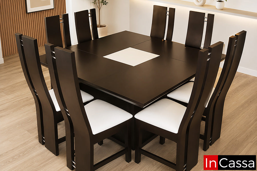 Se aprecia el Comedor Modelo SIDNEY para 8 personas en color chocolate con asientos tapizados en suede color hueso, un diseño de estilo contemporáneo que destaca por su amplia cubierta, líneas limpias y elegante contraste de colores. Su detalle central en tono claro aporta un toque distintivo y sofisticado, mientras que las sillas de respaldo alto con asientos tapizados ofrecen gran comodidad, convirtiéndolo en la opción ideal para disfrutar reuniones familiares y ocasiones especiales con total confort.