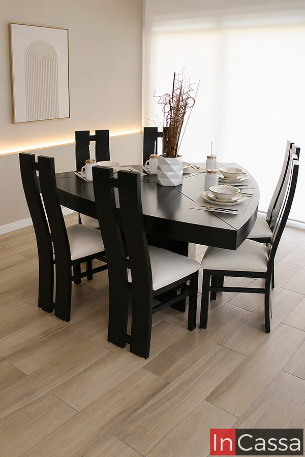 Se observa el Comedor Modelo VIÑA DEL MAR para 6 personas, elaborado en color chocolate con asientos tapizados en suede color hueso. Su mesa de diseño contemporáneo con esquinas curvas aporta elegancia y seguridad, mientras que sus amplias dimensiones brindan comodidad para compartir reuniones familiares y momentos especiales con un estilo moderno y acogedor.