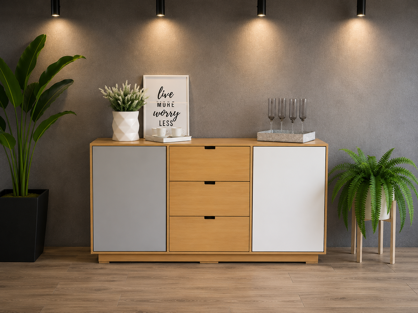 comedor moderno con bufetero, vajilla organizada, decoración neutra, lámpara o florero sobre el mueble y ambiente elegante.