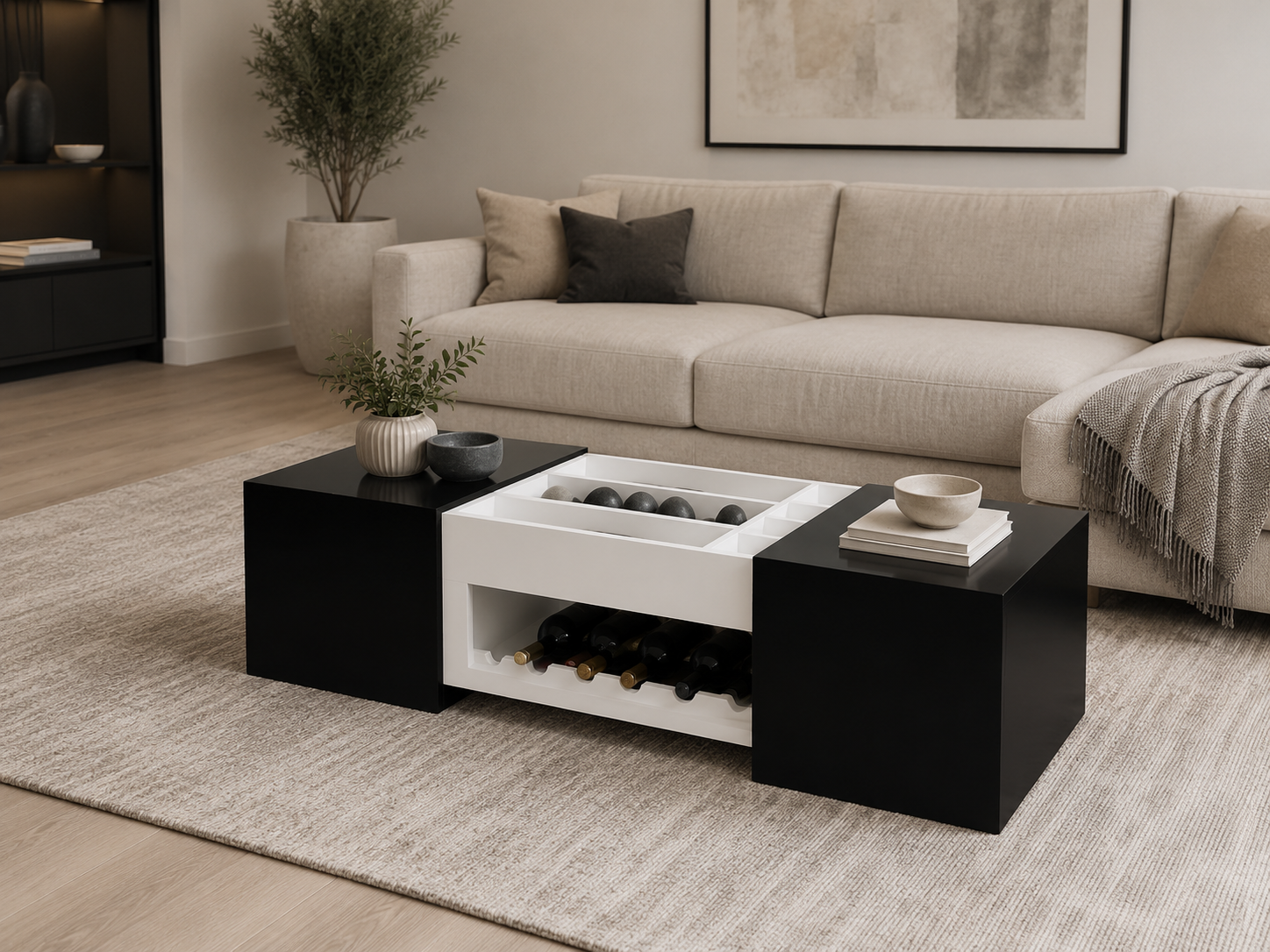 sala moderna con sofá, sillones, mesa de centro, decoración neutra, libros, florero y ambiente cálido.