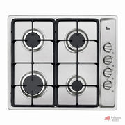La imagen muestra una parrilla Teka empotrable con cuatro quemadores distribuidos para optimizar el espacio en la cocina, con diseño en acero inoxidable que aporta elegancia y modernidad.