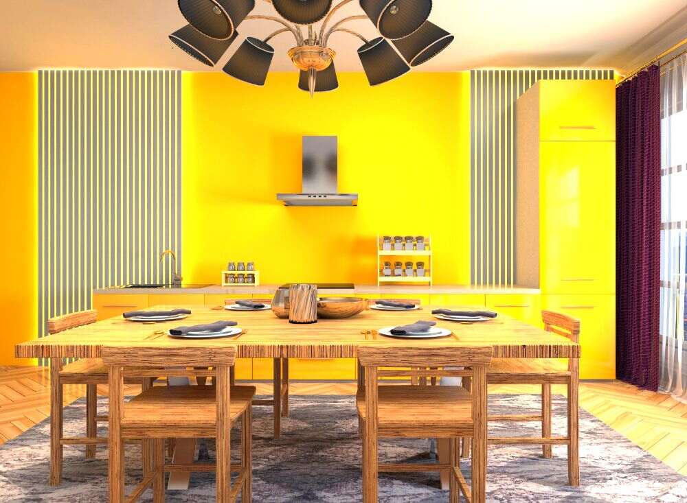 Comedor que combina paredes de color mostaza con una mesa y sillas rústicas fabricadas con madera natural.